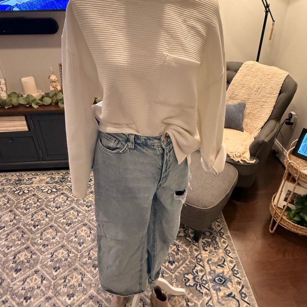 White Ribbed Sweater and Light Blue Jeans